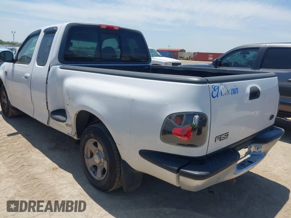 1999 Ford F-150 with VIN 1FTRX07W0XKA01385, listed as a IAAI auction lot 42247809 with 147,105 mi miles and . Bid and sale history available at DreamBid. Image 3.