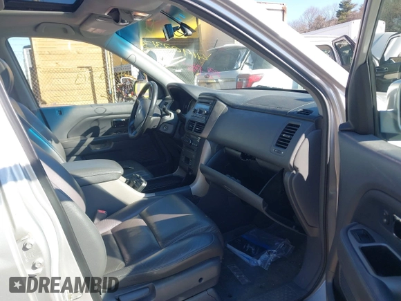 2007 Honda Pilot EX-L with VIN 2HKYF18667H528655, listed as a IAAI auction lot 41902313 with 183,504 mi miles and . Bid and sale history available at DreamBid. Image 5.