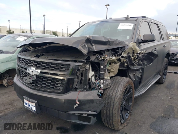 2018 Chevrolet Tahoe LT with VIN 1GNSCBKC5JR126474, listed as a IAAI auction lot 41896310 with 90,928 mi miles and . Bid and sale history available at DreamBid. Image 18.