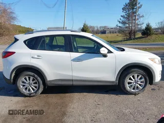 2016 Mazda CX-5 Sport with VIN JM3KE4BY8G0605504, listed as a IAAI auction lot 41866173 with 91,797 mi miles. Bid and sale history available at carsss.com. Image 14.