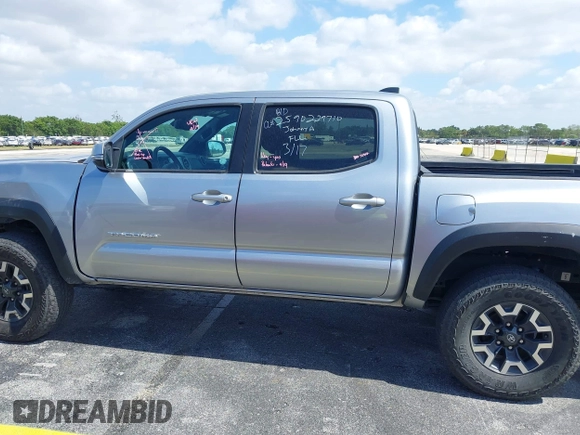 2023 Toyota Tacoma SR z VIN 3TMCZ5AN0PM627654, wystawiony jako IAAI lot #42157641 z przebiegiem 35 015 mil mil oraz . Historia ofert i sprzedaży dostępna na DreamBid. Obrazek 15.
