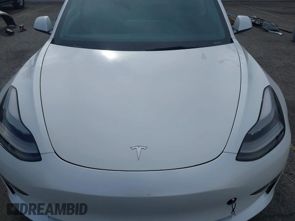 2021 Tesla Model 3 Long Range with VIN 5YJ3E1EB7MF089524, listed as a IAAI auction lot 42023474 with 19,757 mi miles and . Bid and sale history available at carsss.com. Image 10.