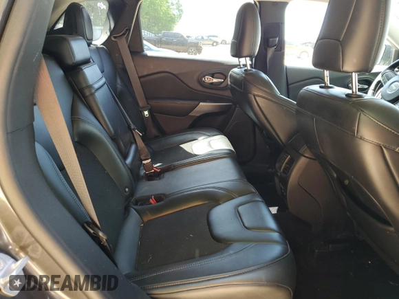 2019 Jeep Cherokee Latitude Plus z VIN 1C4PJLLN0KD151937, wystawiony jako Copart lot #53738255 z przebiegiem 63 450 mil mil oraz Szkoda całkowita • Salvage title. Historia ofert i sprzedaży dostępna na DreamBid. Obrazek 11.