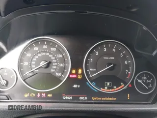 2015 BMW 3 Series 320i with VIN WBA3B1G56FNT64298, listed as a IAAI auction lot 41695116 with 125,926 mi miles. Bid and sale history available at carsss.com. Image 7.