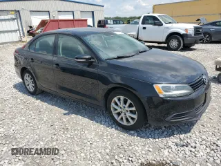 2012 Volkswagen Jetta SE with VIN 3VWDX7AJ3CM064030, listed as a Copart auction lot 62994955 with 185,770 mi miles and Salvage title. Bid and sale history available at DreamBid. Image 4.