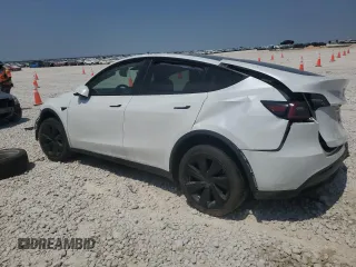 2023 Tesla Model Y Long Range z VIN 7SAYGDEE4PA064502, wystawiony jako Copart lot #53337645 z przebiegiem 16 945 mil mil oraz Szkoda całkowita • Salvage title. Historia ofert i sprzedaży dostępna na DreamBid. Obrazek 2.