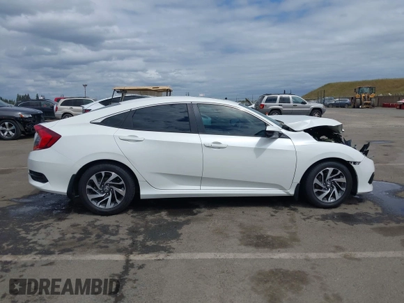 2016 Honda Civic EX with VIN 19XFC2F70GE237560, listed as a IAAI auction lot 42131803 with 189,003 mi miles and . Bid and sale history available at DreamBid. Image 13.