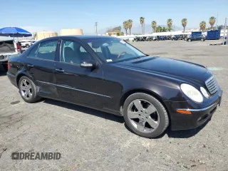2005 Mercedes-Benz E 320 with VIN WDBUF65J55A675993, listed as a Copart auction lot 52446015 with 64,459 mi miles and Salvage Title. Bid and sale history available at DreamBid. Image 4.