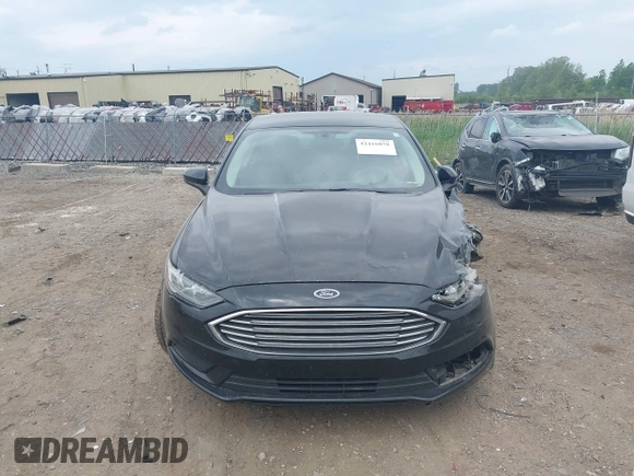 2017 Ford Fusion SE z VIN 3FA6P0H73HR283356, wystawiony jako IAAI lot #42416078 z przebiegiem 52 337 mil mil oraz . Historia ofert i sprzedaży dostępna na DreamBid. Obrazek 12.