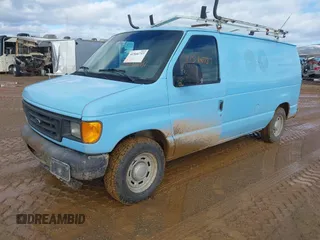 2004 Ford Econoline Cargo with VIN 1FTRE14W24HA72208, listed as a IAAI auction lot 41566737 with 95,391 mi miles. Bid and sale history available at carsss.com. Image 2.
