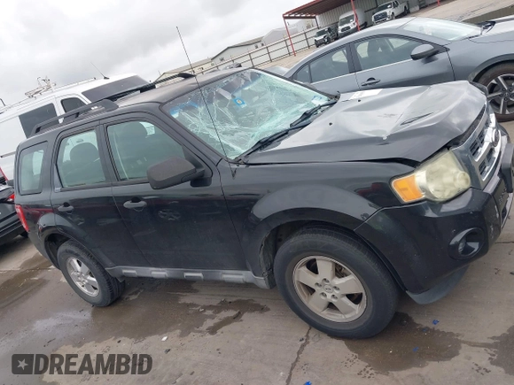 2011 Ford Escape XLS z VIN 1FMCU0C73BKB97601, wystawiony jako IAAI lot #42498599 z przebiegiem 243 282 mil mil oraz . Historia ofert i sprzedaży dostępna na DreamBid. Obrazek 13.