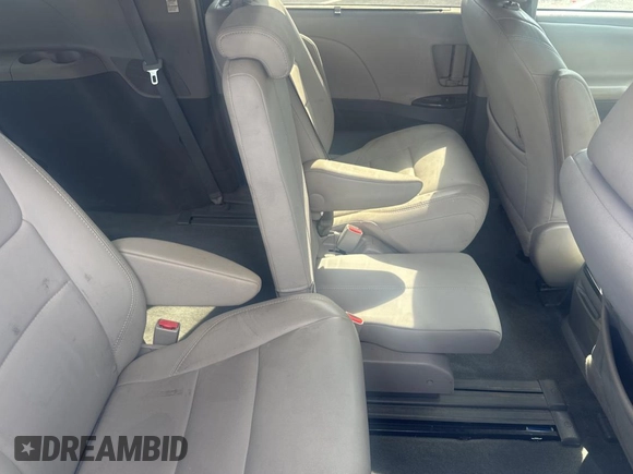 2015 Toyota Sienna XLE with VIN 5TDYK3DC5FS567460, listed as a Copart auction lot 63311295 with 296,433 mi miles and Clean title. Bid and sale history available at DreamBid. Image 6.