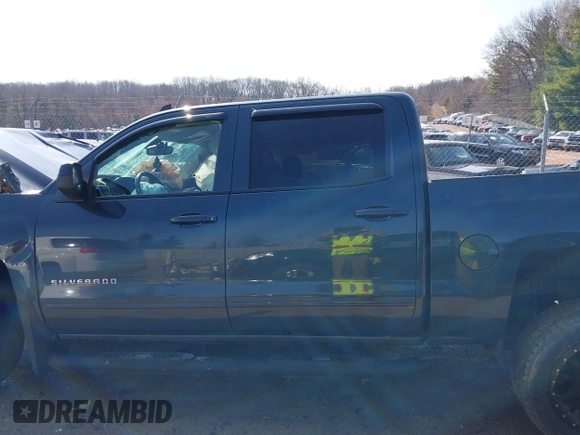 2017 Chevrolet Silverado 1500 LT with VIN 3GCUKREC6HG451671, listed as a IAAI auction lot 41906060 with Not Provided miles and . Bid and sale history available at DreamBid. Image 13.