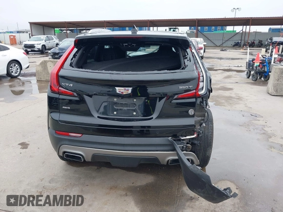 2020 Cadillac XT4 AWD Premium Luxury z VIN 1GYFZDR47LF122394, wystawiony jako IAAI lot #41703115 z przebiegiem 69 366 mil mil oraz . Historia ofert i sprzedaży dostępna na DreamBid. Obrazek 16.