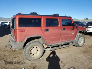 2003 Hummer H2 with VIN 5GRGN23U33H125797, listed as a Copart auction lot 77170554 with 166,739 mi miles and Clean Title. Bid and sale history available at carsss.com. Image 3.