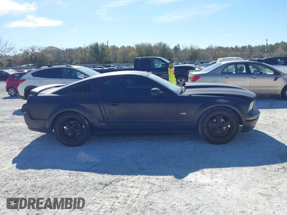 2005 Ford Mustang Deluxe with VIN 1ZVFT80N655136118, listed as a IAAI auction lot 41811969 with 104,071 mi miles. Bid and sale history available at carsss.com. Image 13.
