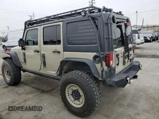 2018 Jeep Wrangler JK Unlimited Rubicon with VIN 1C4BJWFG4JL891312, listed as a Copart auction lot 87041334 with 51,286 mi miles and Salvage Title. Bid and sale history available at carsss.com. Image 2.