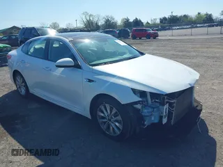 2016 Kia Optima EX with VIN 5XXGU4L35GG098080, listed as a IAAI auction lot 41994612 with 86,646 mi miles and . Bid and sale history available at carsss.com. Image 1.