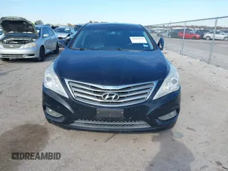 2014 Hyundai Azera Limited with VIN KMHFH4JG7EA353094, listed as a IAAI auction lot 41043222 with 184,924 mi miles and . Bid and sale history available at DreamBid. Image 12.