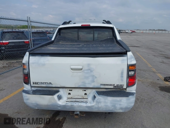 2007 Honda Ridgeline RTX with VIN 2HJYK16307H544780, listed as a IAAI auction lot 42169545 with 174,495 mi miles. Bid and sale history available at carsss.com. Image 13.