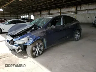2022 Tesla Model Y Long Range z VIN 7SAYGDEE5NA014737, wystawiony jako Copart lot #58531955 z przebiegiem 34 565 mil mil oraz Szkoda całkowita • Salvage title. Historia ofert i sprzedaży dostępna na DreamBid. Obrazek 1.