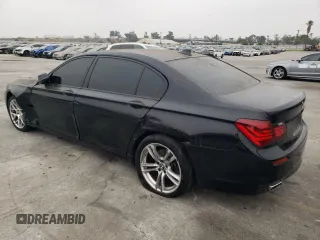 2013 BMW 7 Series 740Li with VIN WBAYE4C51DD137687, listed as a Copart auction lot 76103944 with 134,609 mi miles and Salvage title. Bid and sale history available at DreamBid. Image 2.