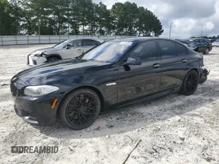 2013 BMW 5 Series 535i with VIN WBAFR7C57DC829343, listed as a Copart auction lot 61143005 with 127,779 mi miles and Salvage title. Bid and sale history available at DreamBid. Image 1.