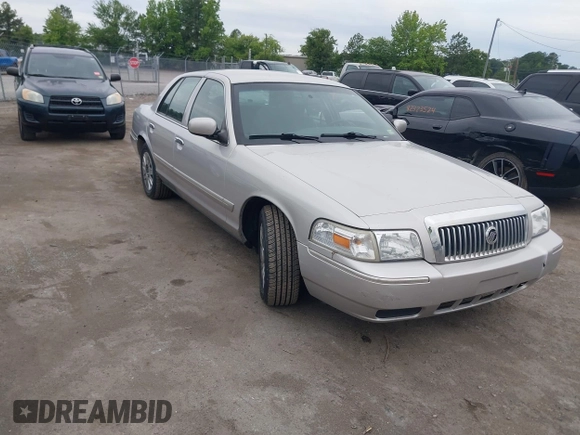 2006 Mercury Grand Marquis GS z VIN 2MEFM74V16X646802, wystawiony jako IAAI lot #42358697 z przebiegiem 169 321 mil mil oraz . Historia ofert i sprzedaży dostępna na DreamBid. Obrazek 1.