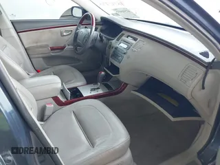 2007 Hyundai Azera SE z VIN KMHFC46FX7A147219, wystawiony jako IAAI lot #42346432 z przebiegiem 163 646 mil mil oraz . Historia ofert i sprzedaży dostępna na DreamBid. Obrazek 5.