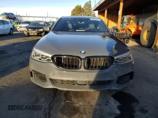 2019 BMW 5 Series M550i xDrive with VIN WBAJB9C55KB288709, listed as a Copart auction lot 46590735 with 58,256 mi miles and Salvage title. Bid and sale history available at DreamBid. Image 5.