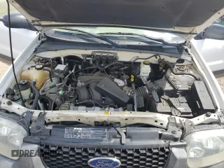 2005 Ford Escape XLT z VIN 1FMYU93145DA04306, wystawiony jako Copart lot #56209425 z przebiegiem 124 956 mil mil oraz Szkoda całkowita • Salvage title. Historia ofert i sprzedaży dostępna na DreamBid. Obrazek 12.