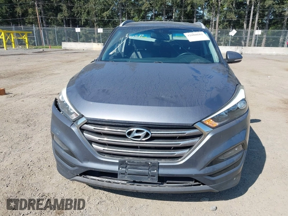 2016 Hyundai Tucson Limited with VIN KM8J33A26GU137391, listed as a IAAI auction lot 42088662 with 72,048 mi miles. Bid and sale history available at carsss.com. Image 13.