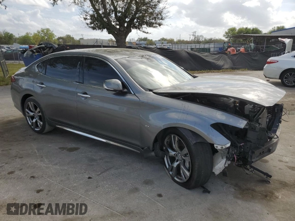 2015 Infiniti Q70 z VIN JN1BY1PR9FM831870, wystawiony jako Copart lot #46022015 z przebiegiem 144 553 mil mil oraz Szkoda całkowita • Salvage title. Historia ofert i sprzedaży dostępna na DreamBid. Obrazek 4.