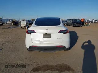 2023 Tesla Model Y Long Range with VIN 7SAYGDEE3PF817097, listed as a IAAI auction lot 41767294 with 64,047 mi miles and . Bid and sale history available at DreamBid. Image 17.