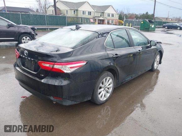 2019 Toyota Camry LE with VIN 4T1B11HK2KU263910, listed as a IAAI auction lot 42060008 with 31,433 mi miles and . Bid and sale history available at DreamBid. Image 4.