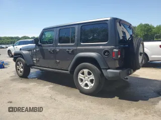 2020 Jeep Wrangler Unlimited Black and Tan with VIN 1C4HJXDGXLW221705, listed as a Copart auction lot 56224785 with 82,360 mi miles and Salvage title. Bid and sale history available at DreamBid. Image 2.