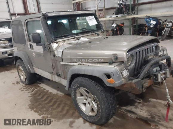 2005 Jeep Wrangler Rubicon with VIN 1J4FA69S65P311732, listed as a IAAI auction lot 41442147 with 174,277 mi miles. Bid and sale history available at carsss.com. Image 1.