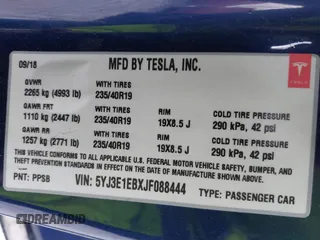 2018 Tesla Model 3 Long Range Battery z VIN 5YJ3E1EBXJF088444, wystawiony jako IAAI lot #42072860 z przebiegiem 46 063 mil mil oraz . Historia ofert i sprzedaży dostępna na DreamBid. Obrazek 9.