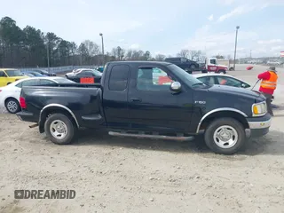 2000 Ford F-150 XL with VIN 1FTZX0725YKA09559, listed as a IAAI auction lot 41810954 with Not provided miles and . Bid and sale history available at DreamBid. Image 13.
