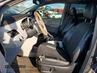 2013 Toyota Sienna SE with VIN 5TDXK3DC8DS310754, listed as a Copart auction lot 74880094 with 337,573 mi miles and Salvage title. Bid and sale history available at DreamBid. Image 7.