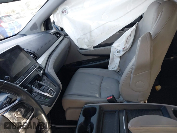 2019 Honda Odyssey EX-L with VIN 5FNRL6H74KB061567, listed as a IAAI auction lot 41810919 with 129,146 mi miles. Bid and sale history available at carsss.com. Image 5.