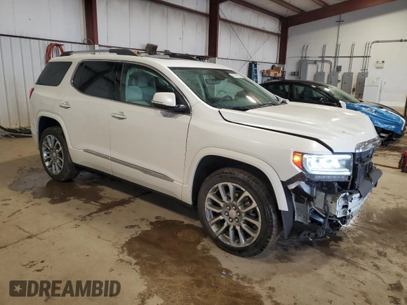 2023 GMC Acadia Denali with VIN 1GKKNXLS3PZ237768, listed as a Copart auction lot 57879665 with Not provided miles and Salvage title. Bid and sale history available at DreamBid. Image 4.