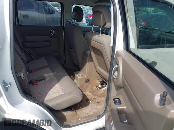 2010 Dodge Nitro Heat with VIN 1D4PU4GKXAW175021, listed as a IAAI auction lot 42274875 with 158,279 mi miles and . Bid and sale history available at DreamBid. Image 8.
