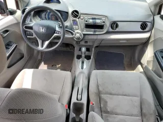 2011 Honda Insight with VIN JHMZE2H31BS008097, listed as a Copart auction lot 60780625 with 111,688 mi miles and Salvage title. Bid and sale history available at DreamBid. Image 8.