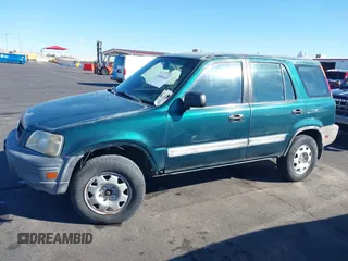 1999 Honda CR-V LX with VIN JHLRD1847XC031475, listed as a IAAI auction lot 41606369 with 254,445 mi miles. Bid and sale history available at carsss.com. Image 6.