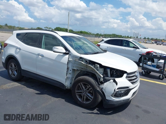 2017 Hyundai Santa Fe 2.4L z VIN 5NMZU3LB9HH034850, wystawiony jako IAAI lot #42342054 z przebiegiem 192 154 mil mil oraz . Historia ofert i sprzedaży dostępna na DreamBid. Obrazek 1.