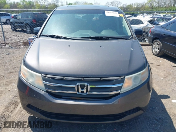 2013 Honda Odyssey EX-L with VIN 5FNRL5H65DB011071, listed as a IAAI auction lot 41992265 with 192,624 mi miles and . Bid and sale history available at DreamBid. Image 12.