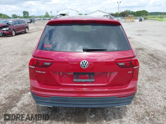 2018 Volkswagen Tiguan S with VIN 3VV1B7AX3JM045193, listed as a IAAI auction lot 42311886 with 69,049 mi miles and . Bid and sale history available at DreamBid. Image 16.