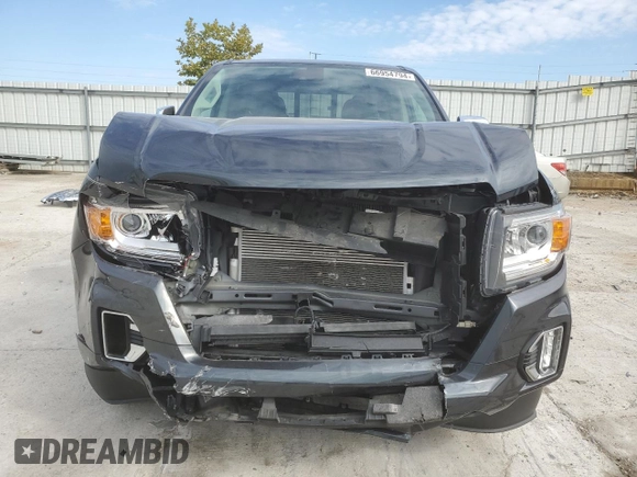 2021 GMC Canyon 4WD Denali with VIN 1GTG6EEN0M1113347, listed as a Copart auction lot 66954794 with 15,767 mi miles and Salvage Title. Bid and sale history available at carsss.com. Image 5.