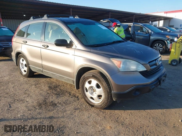 2009 Honda CR-V LX with VIN 5J6RE48389L011915, listed as a IAAI auction lot 41301796 with 214,807 mi miles. Bid and sale history available at carsss.com. Image 1.